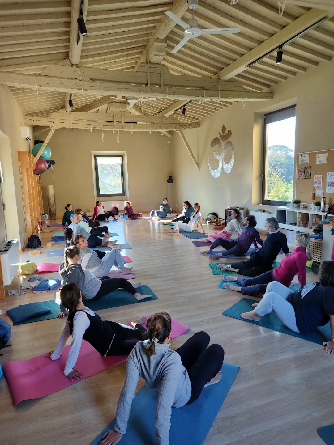 A community yoga practice inside the Villa Vrindavana ashram