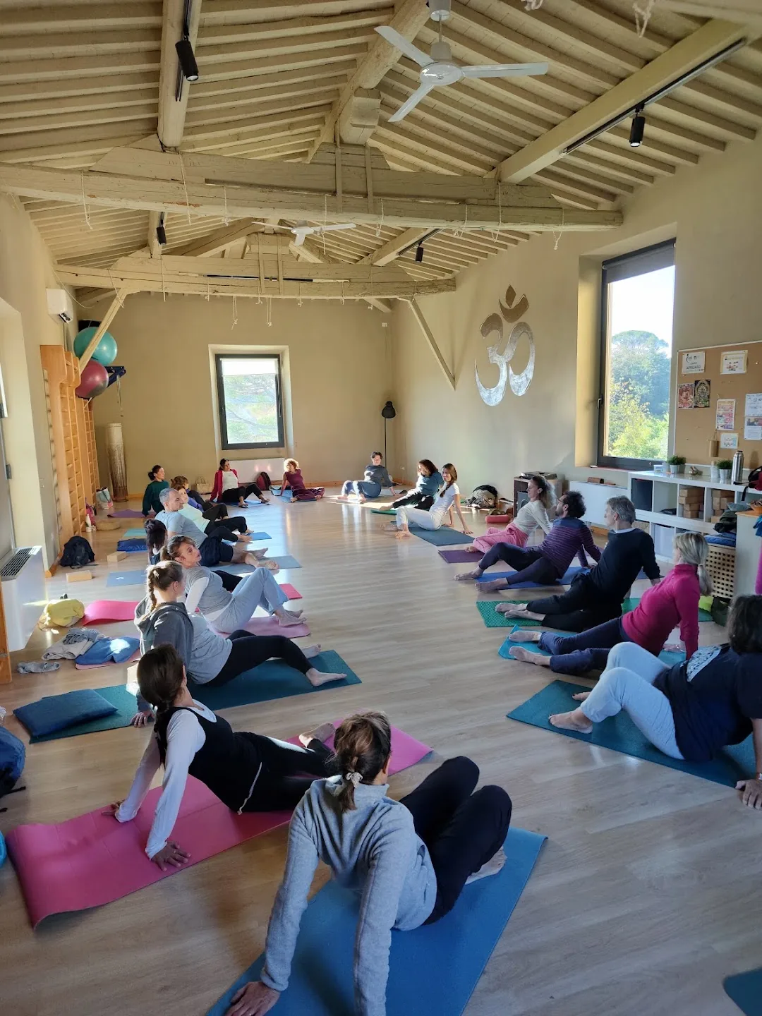 A community yoga practice inside the Villa Vrindavana ashram